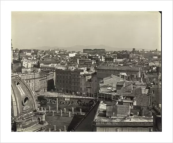 Panoramic view of the city of Rome; in the background the Colosseum