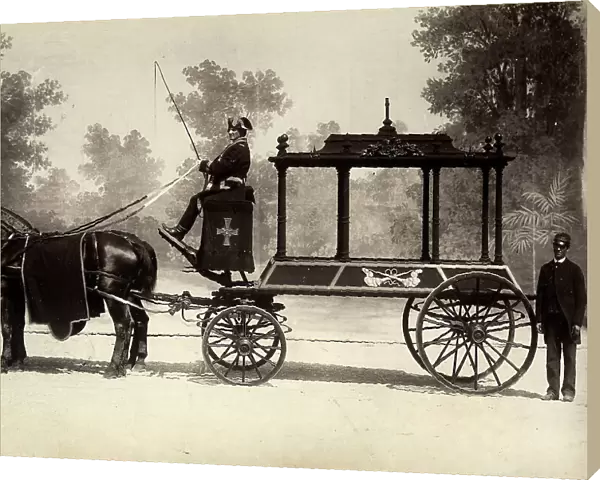 Hearse pull by horses with coachman