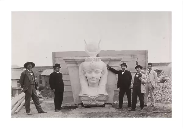 Construction of the Egyptian Museum, undertaking of G. Garozzo and F. Zafferani': engineers and workers flanking a decorative sculpture at the museum