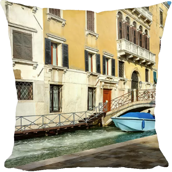 Italy, Veneto, Venice, Motor boat passing under bridge on canal