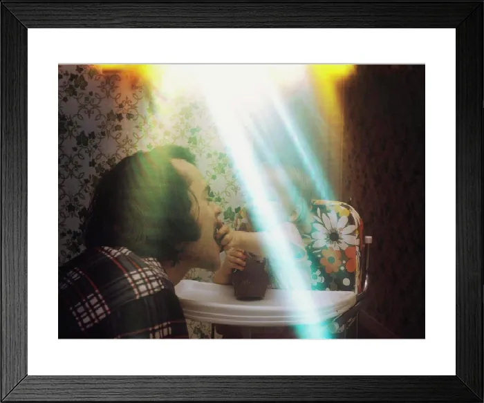 Framed Print : Young Boy Feeding Dad Chocolate Print Framed Print : Young Boy Feeding Dad Chocolate Print