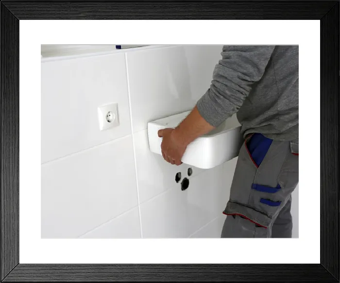 Framed Print : Plumber Installs New Washbasin Print Framed Print : Plumber Installs New Washbasin Print