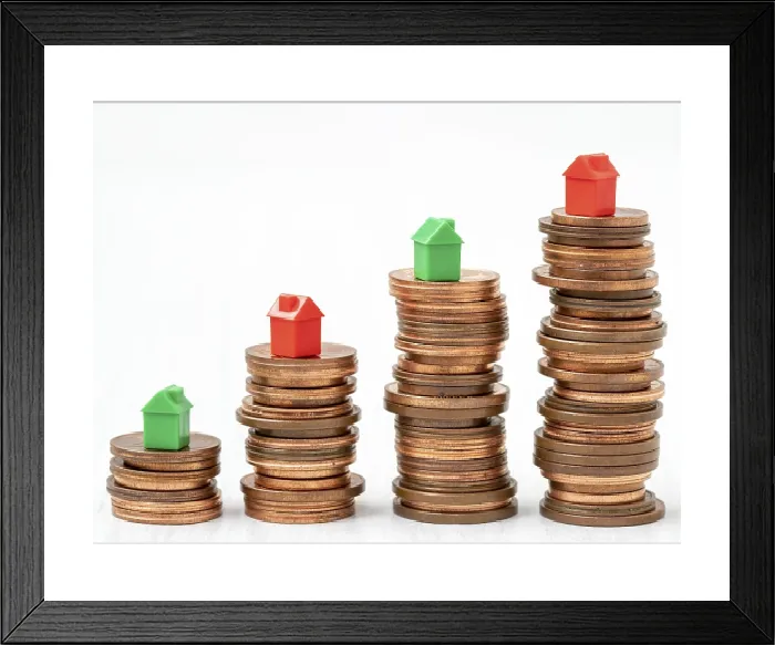 Framed Print : Stacked Coins with Mini Houses Print Framed Print : Stacked Coins with Mini Houses Print