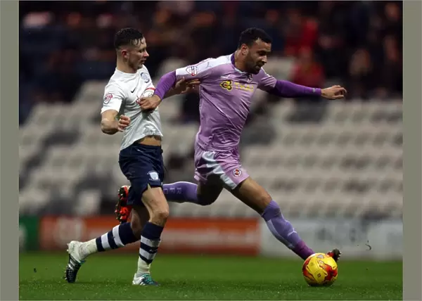 Battle for the Ball: Browne vs. Robson-Kanu in Preston North End vs. Reading Championship Clash at Deepdale