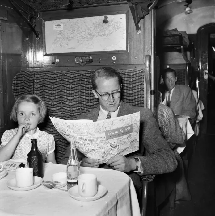 Framed Print : Train Journey Print: Man and Girl Seated with Refreshments