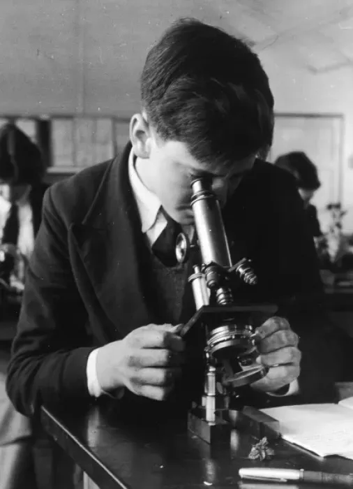 Framed Print : 1950s Boy Examining Microscope Print Framed Print : 1950s Boy Examining Microscope Print