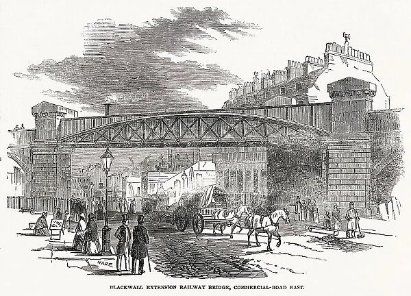 Blackwall Extension Railway Bridge over the Commercial-Road East. The new link in the metropolitan system of railways was to bring the Eastern Counties and other lines terminating at Shoreditch. Date: 1849
