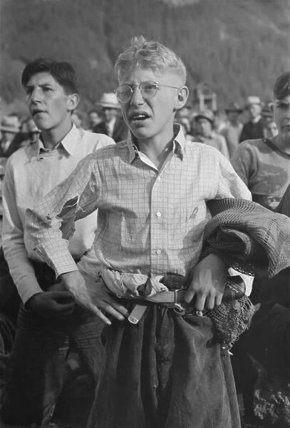 Boy watching miners contest at Labor Day celebration, Silver