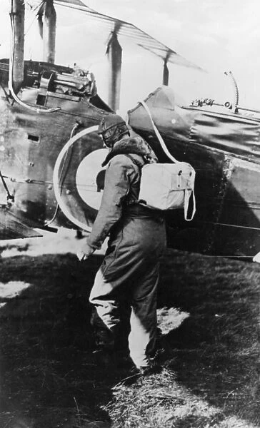 British pilot getting into his plane, WW1
