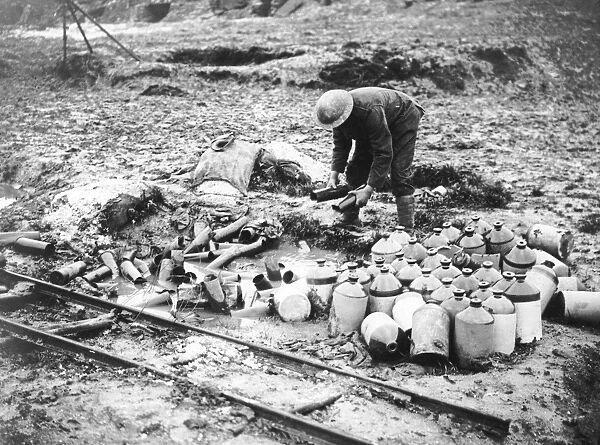 British soldier cleaning up debris, Western Front, WW1