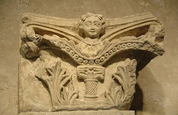 Byzantine art. Capital decorated with a relief of a woman. B