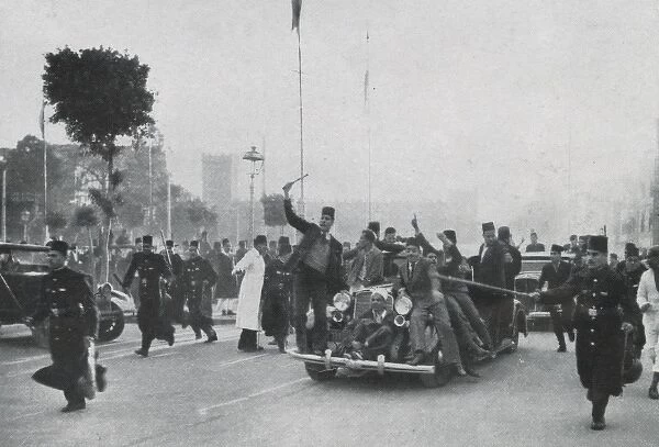 Car jumpers escort Nahas Pasha to the royal wedding