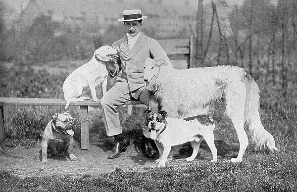 Cecil Aldin with four dogs in Bedford Park, West London