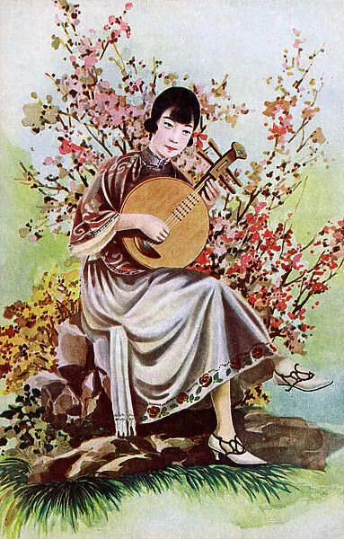 Chinese woman playing a Ruan