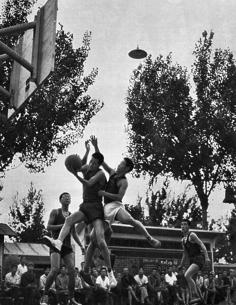 Communist China - workers playing basketball
