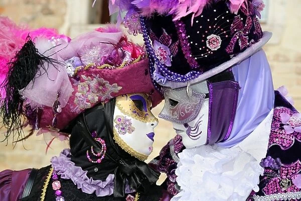 Couple wearing Venice Carnival Costumes
