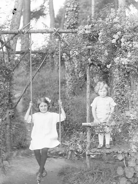 Two Edwardian children in a garden, Mid Wales