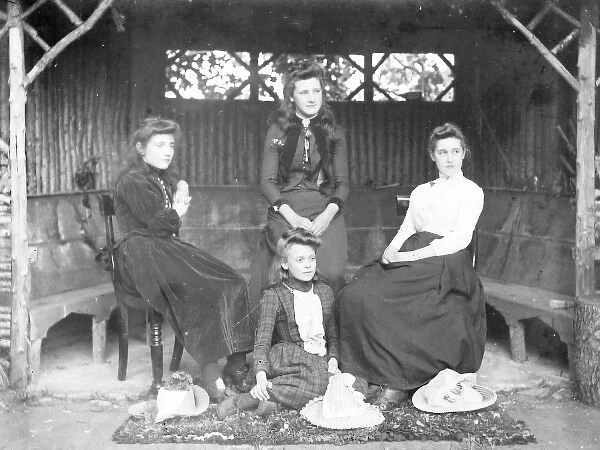Four Edwardian sisters in a rustic gazebo, Mid Wales