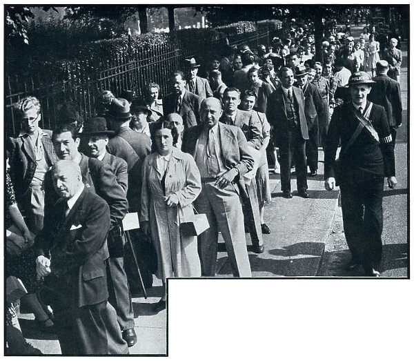 Enemy aliens queue to register in London, September 1939