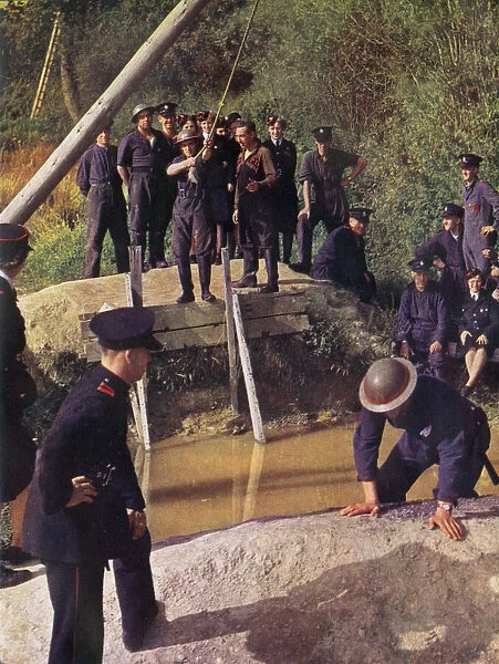 Firemen in training at a Water Jump