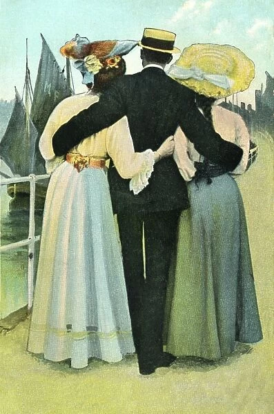 Gentleman strolling by the seafront with two women