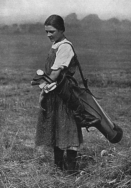 Girl golf caddy, WW1