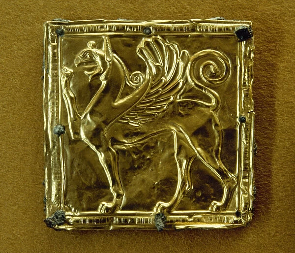 Gold plate depicting a winged griffin. 6th century B. C. Delp