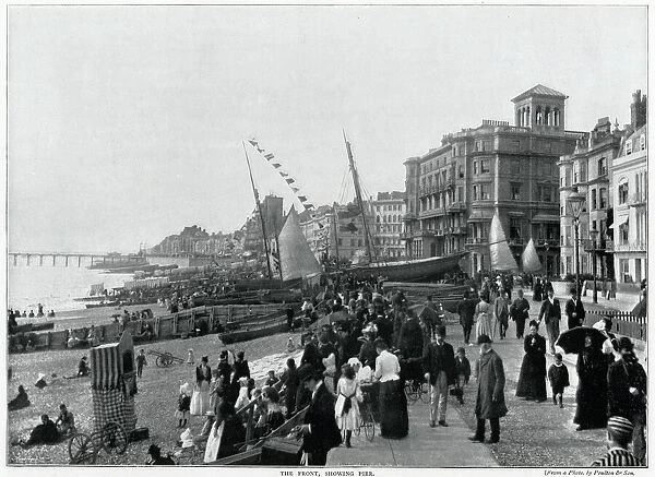 Hastings front, Victorias watching a punch and Judy show on the beach. Date: 1895