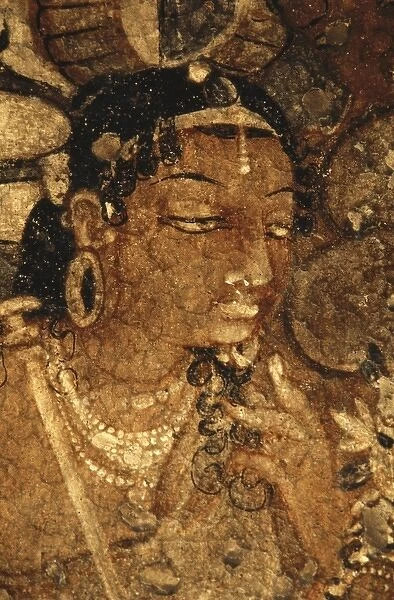 INDIA. Ajanta. Ajanta Caves. Face of a woman. Detail