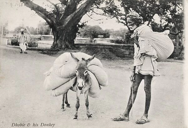Indian Dhobie with his miniature donkey