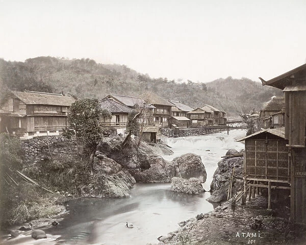 Japan - village of Atami, with river and weir