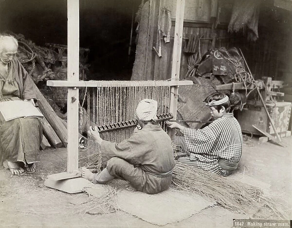 Japanese men weaving straw mats, Japan