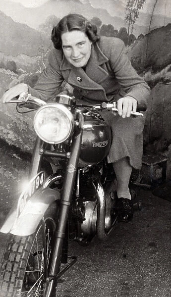 Lady on a 1948 Triumph motorcycle