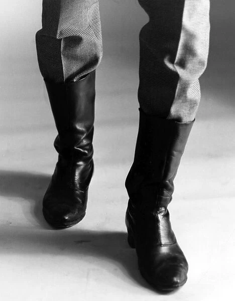 BOOTS. The boots someone is wearing. Date: late 1960s
