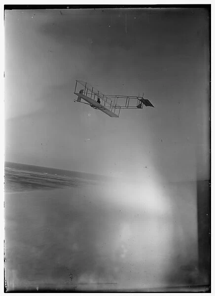 Left rear view of glider at a high altitude; Kitty Hawk, Nor