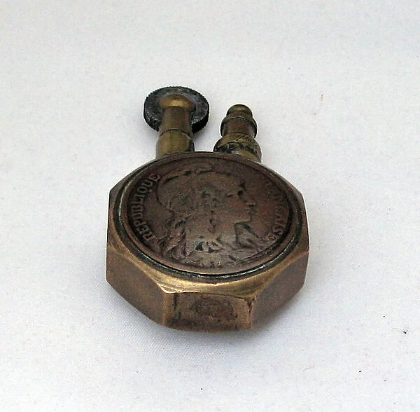 Lighter constructed from a large brass nut