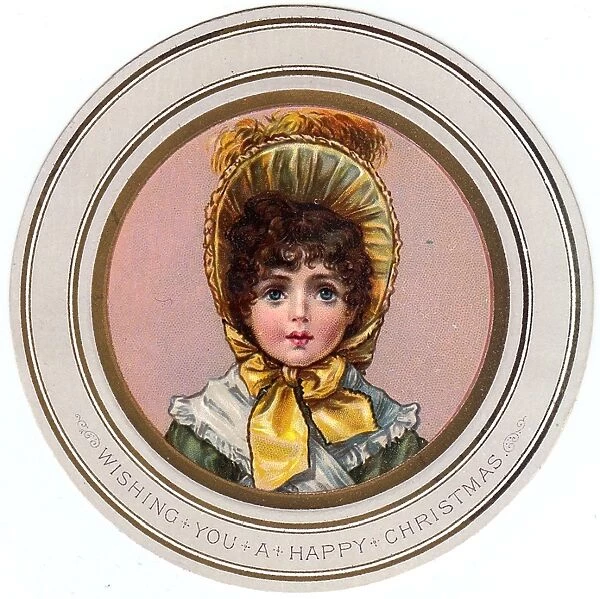 Little girl in a yellow bonnet on a circular Christmas card
