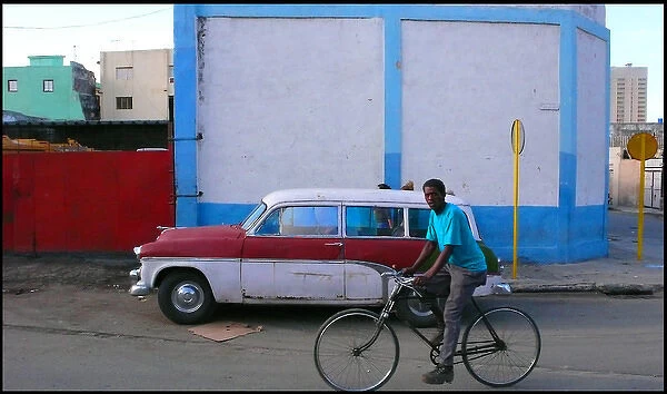Man on bike, street, Havana Cuba