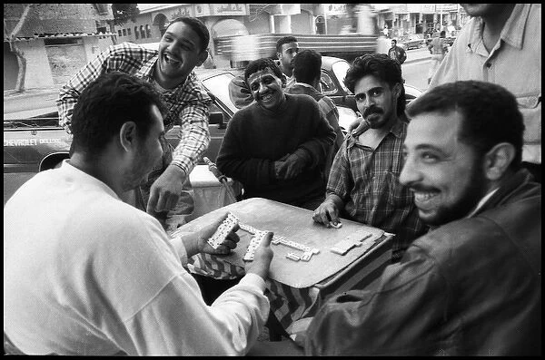 Men playing dominoes near Alexandria, Egypt