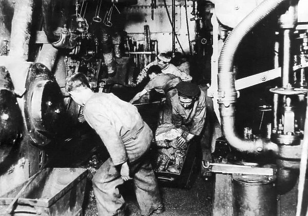 Men at work in engine room of a ship, WW1