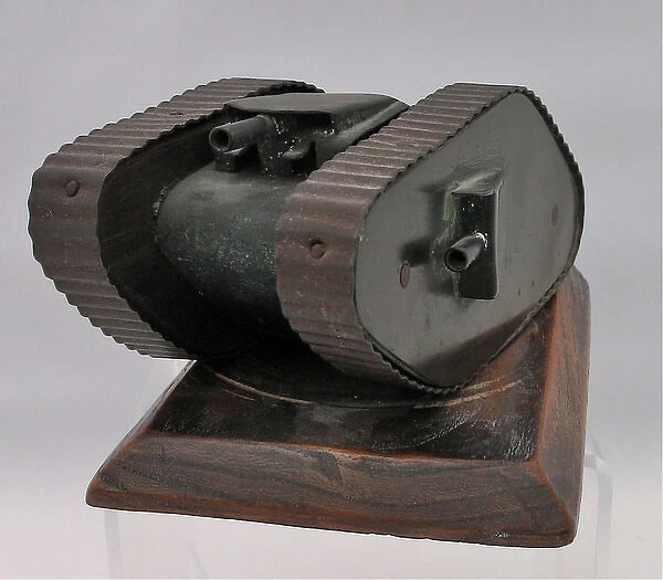 Metal model of WW1 tank on wooden base