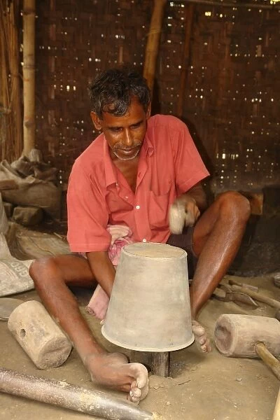 Metal worker at Matiari, West Bengal, India