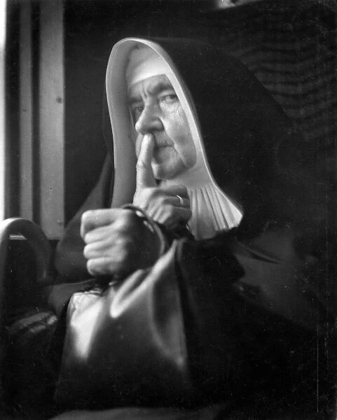 Nun looking at the camera