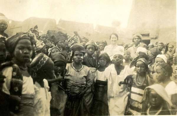 Nurse Mary Henry with the children of the Emir in Lagos