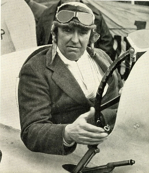 Parry Thomas, motor racing driver, at the wheel of Babs