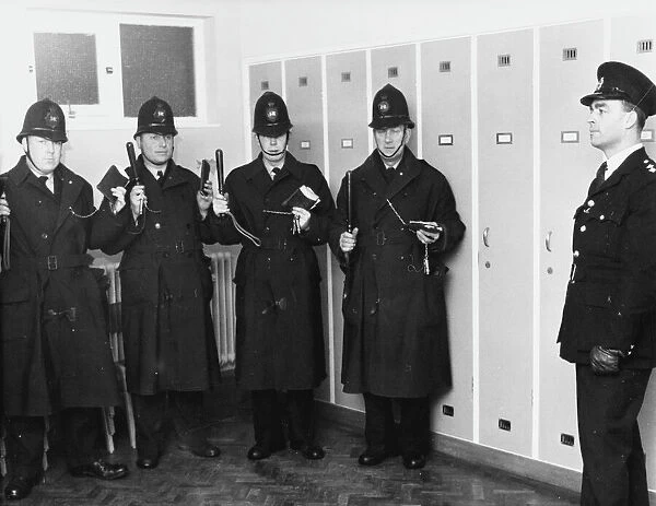 Policemen in station parade room, London