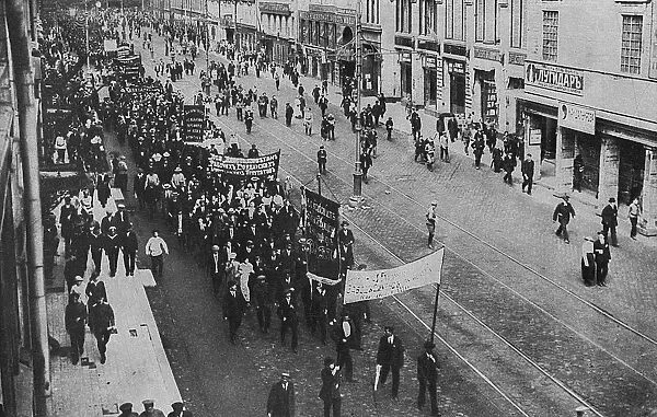 Political parade with banners in a Russian street