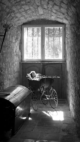 Pram in an antique gallery, France