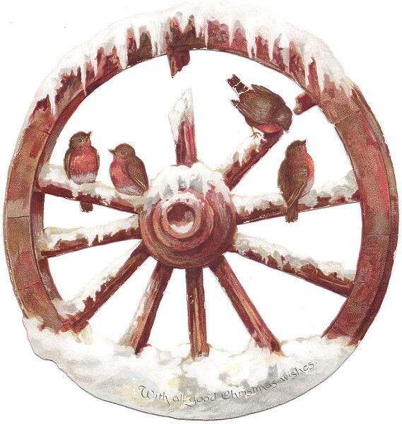Robins perched on a wheel on a cutout Christmas card