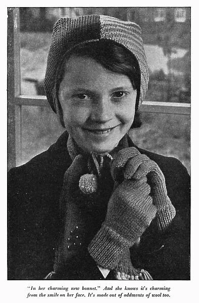 Smiling 1940s girl in a knitted hat